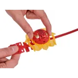 Figurka Attack Mantida Bakugan umieszczona przy pojemniku kolekcjonerskim