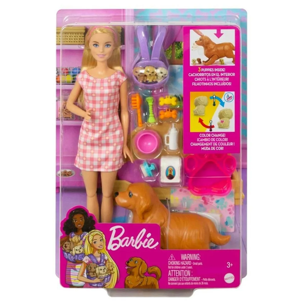 Barbie z suczką i trzema szczeniętami podczas zabawy zestawem