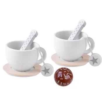 biały dzbanek z gwiazdką oraz filiżanki w zestawie do zabawy