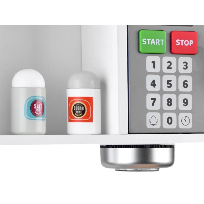 lodówka z dystrybutorem wody i efektem świetlnym w kuchni dziecięcej