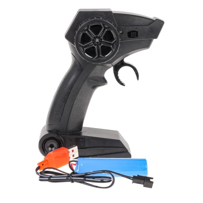 Widok auta Rock SHAKE 1:14 pokonującego przeszkodę terenową