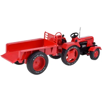 przyczepka traktora odczepiona obok pojazdu