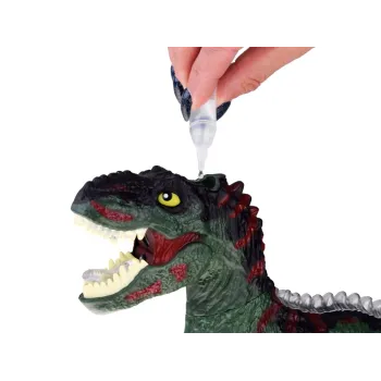 Kolorowe światła na grzbiecie zabawkowego dinozaura