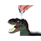 Kolorowe światła na grzbiecie zabawkowego dinozaura