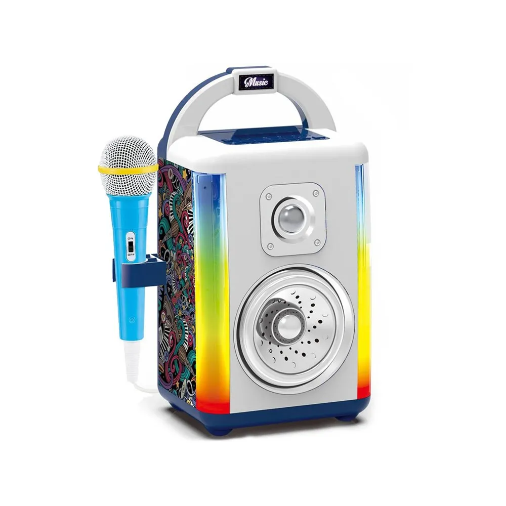 Mikrofon dołączony do zestawu leżący przy głośniku muzycznym