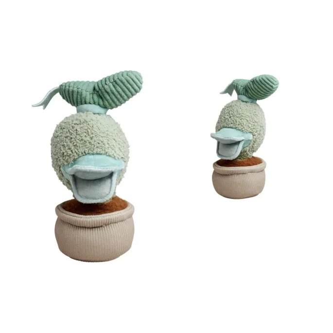 pluszowy Donald Duck w formie kwiatka na pastelowym tle