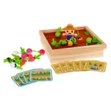 zbliżenie na komponenty gry z marchewkami i robaczkami