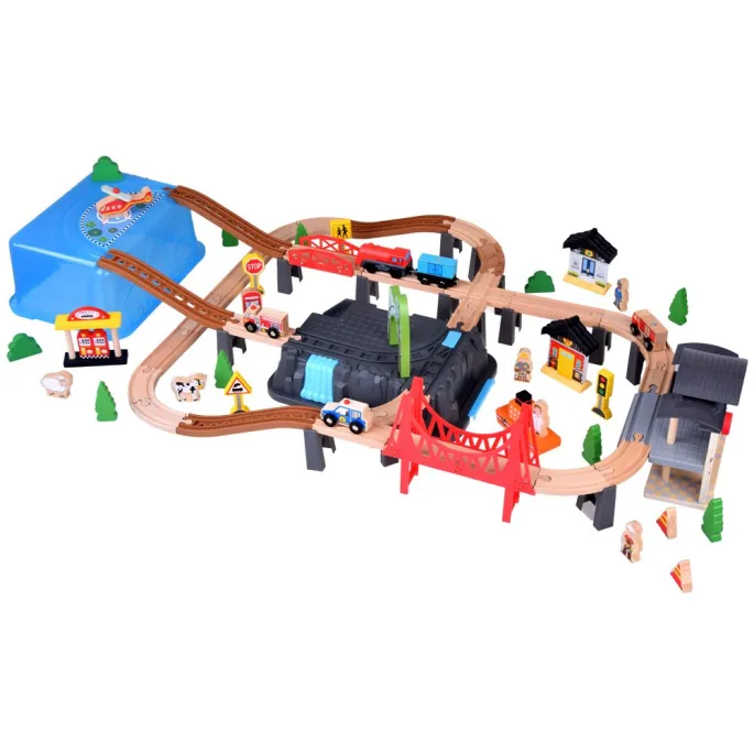 widok pociągu z efektem świetlnym na torach wśród budynków