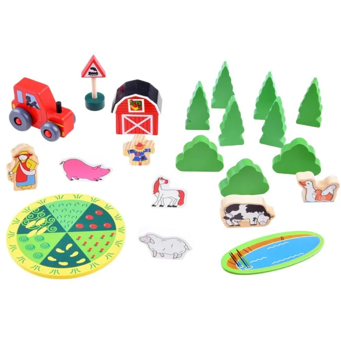 cysterna z mlekiem i znak drogowy obok torów