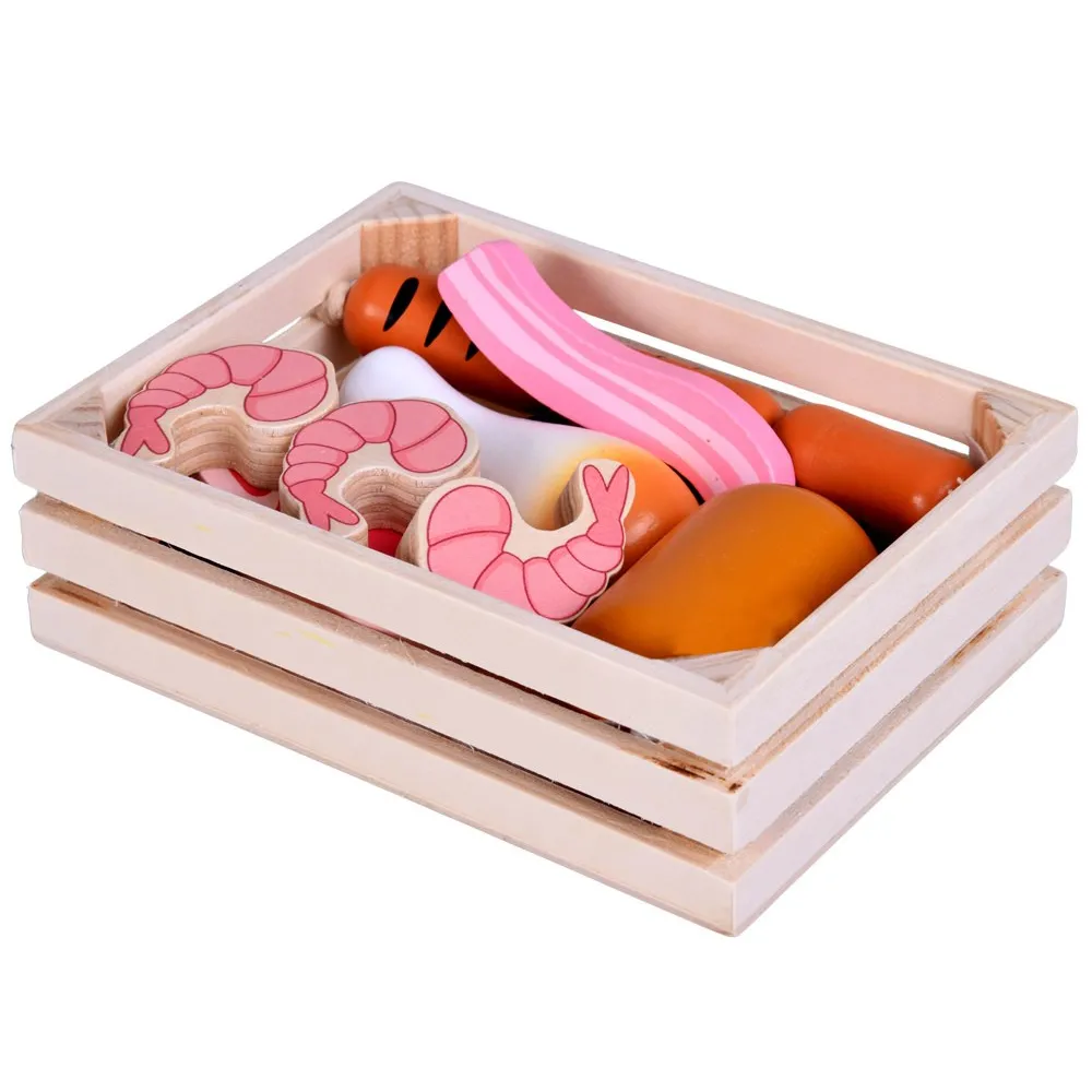 kolorowe zabawkowe mięsa i ryba w skrzynce dziecięcej