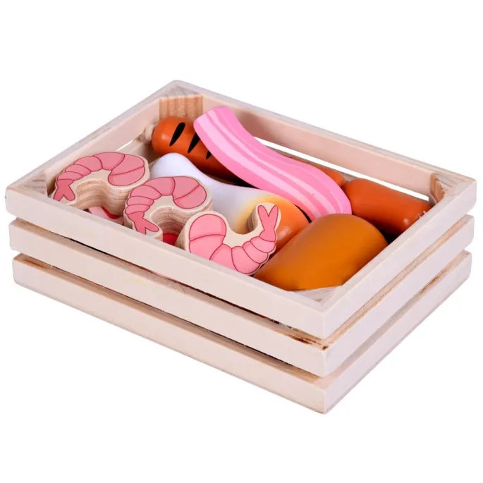 kolorowe zabawkowe mięsa i ryba w skrzynce dziecięcej