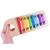 widok na cały zestaw: cymbałki, młoteczek i trzy kulki