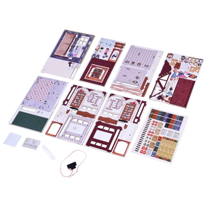 Detal gotowego modelu księgarni wykonanej z precyzyjnie wyciętych drewnianych elementów