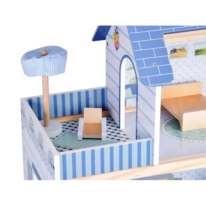 otwarte pomieszczenia domku dla lalek z aranżacją mebelków