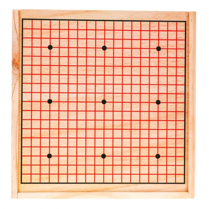plansza do gry GO z kamieniami w czarnym i białym kolorze
