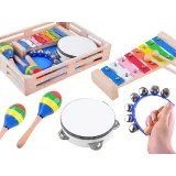 drewniany zestaw instrumentów muzycznych 4w1 na białym tle