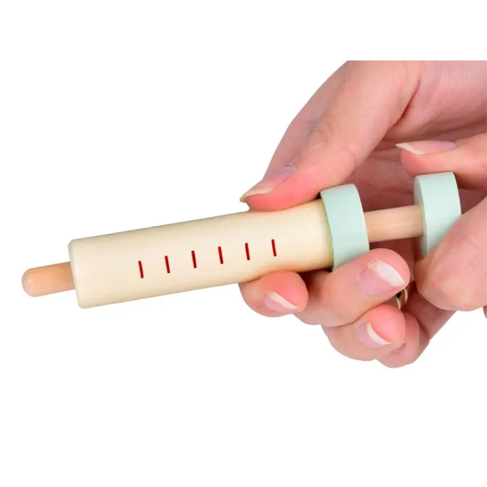 strzykawka i termometr z kompletu apteczki dziecięcej