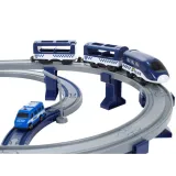 lokomotywa z magnetycznymi zapięciami ciągnąca wagony