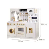 akcesoria kuchenne rozłożone wokół kuchni glamour