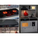 detal akcesoriów: garnek z pokrywką, patelnia i łopatka przy kuchni