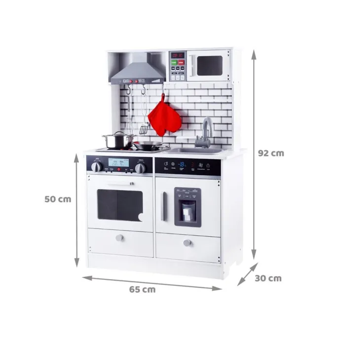zestaw kuchenny z akcesoriami ustawiony w pokoju dziecięcym