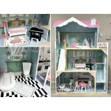 wnętrze domku dla lalek z ustawionymi drewnianymi meblami