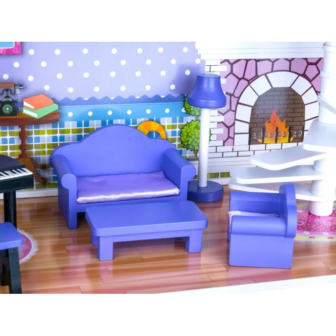 pokój dzienny z kompletem mebli i schodami w domku dla lalek
