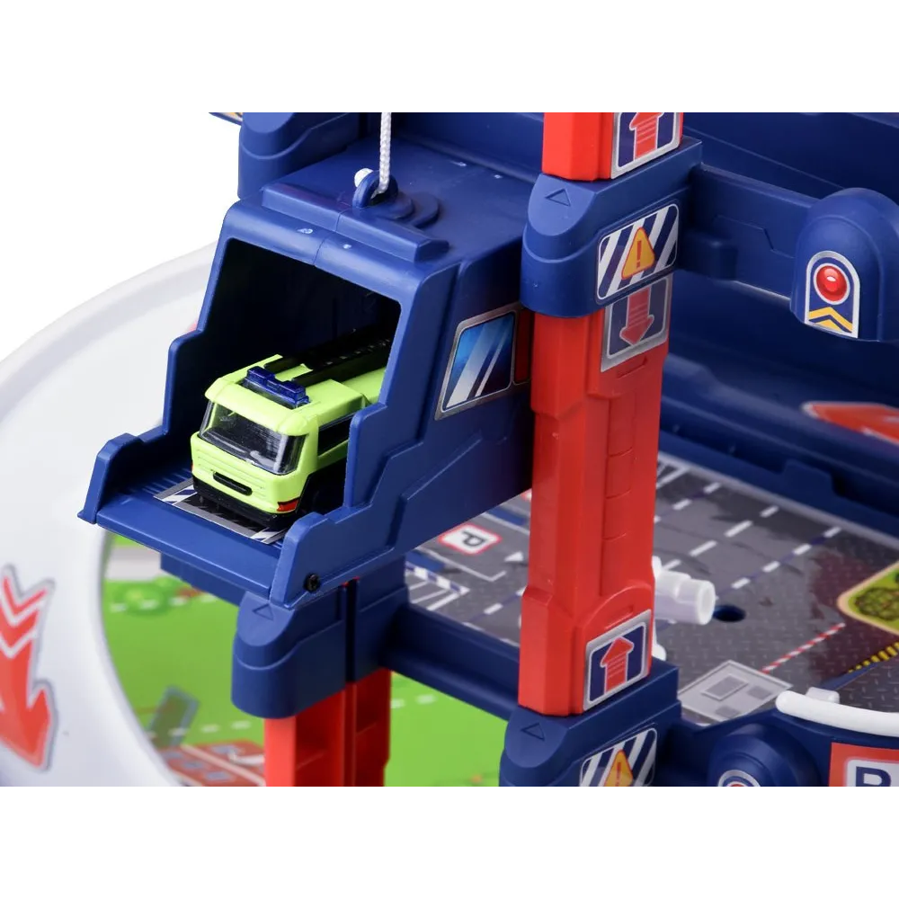 dwa metalowe samochodziki na trasie parkingu