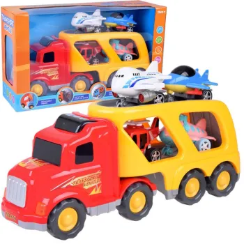 Duży samochód tir laweta z widocznymi samolotami i helikopterem