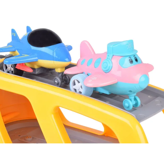 Elementy zestawu na tle kolorowego opakowania prezentującego produkt