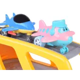 Elementy zestawu na tle kolorowego opakowania prezentującego produkt