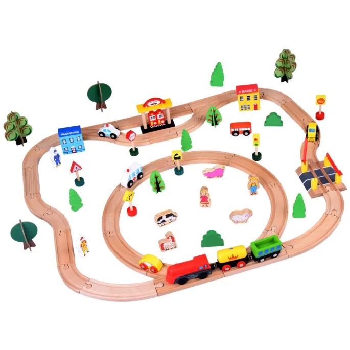 zestaw torów kolejowych z wagonikami i budynkami dla dzieci
