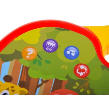 Pianinko interaktywne podczas zabawy w dziecięcych rękach