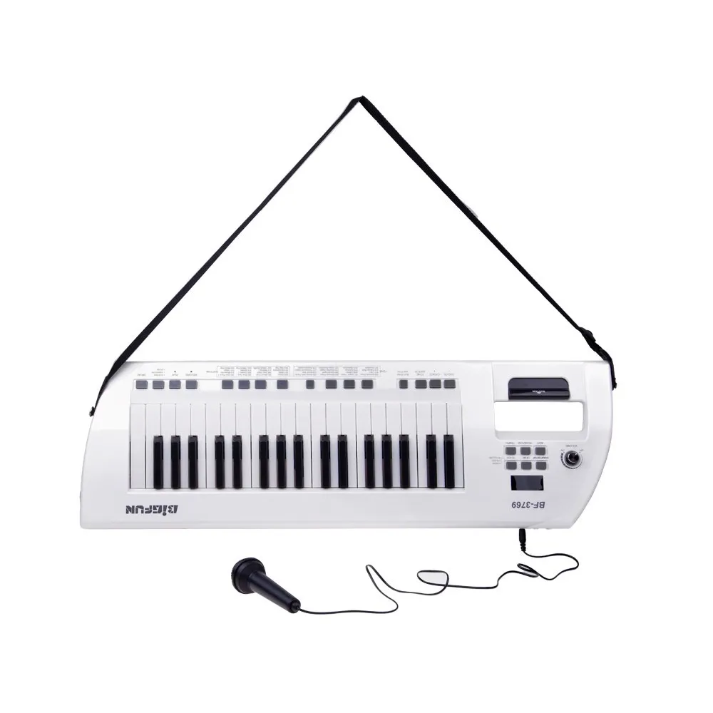 zbliżenie na przyciski sterujące pianina elektrycznego dla dzieci