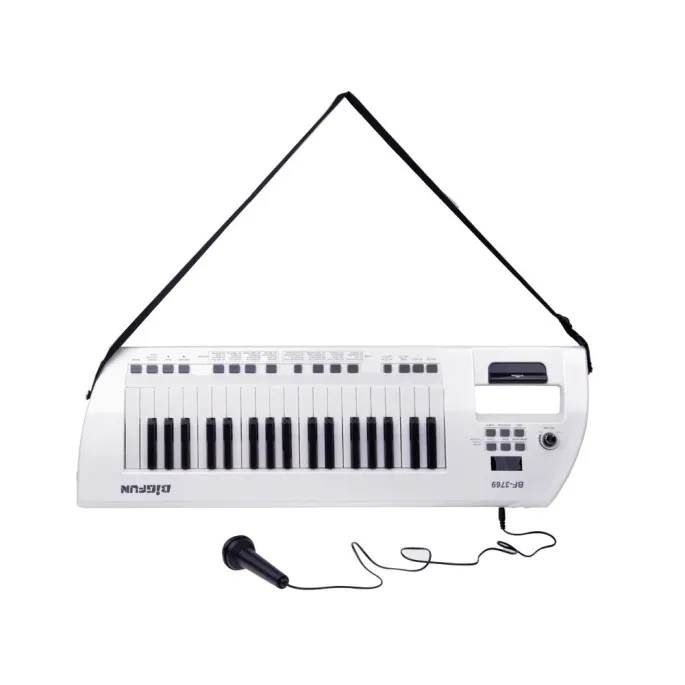 zbliżenie na przyciski sterujące pianina elektrycznego dla dzieci