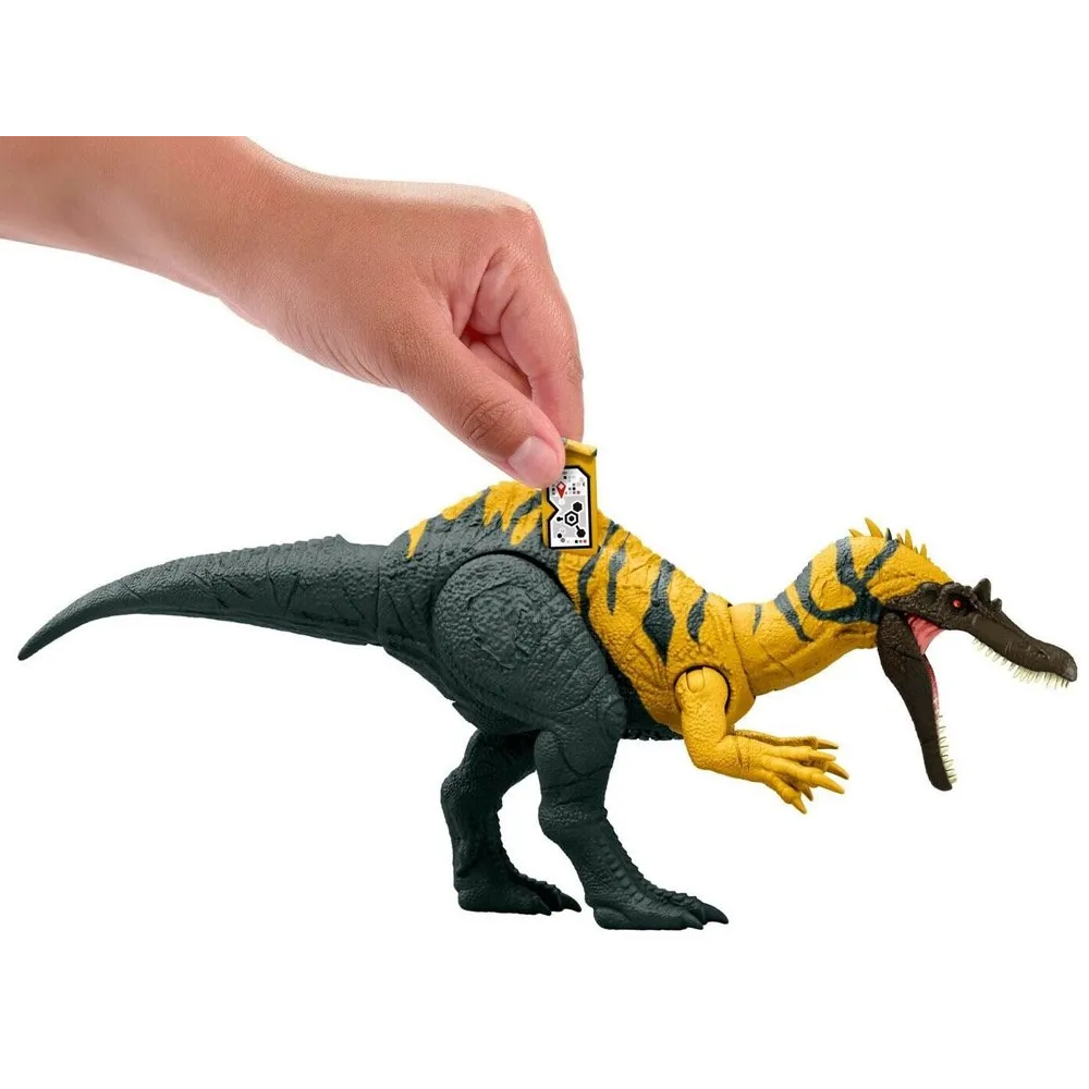 Figurka dinozaura w dynamicznej pozie, widoczny detal uzębienia