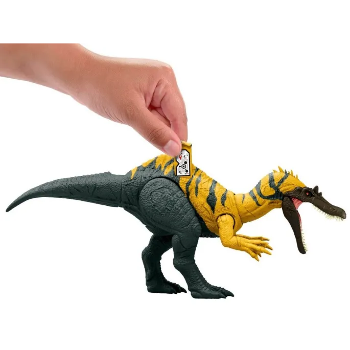 Figurka dinozaura w dynamicznej pozie, widoczny detal uzębienia