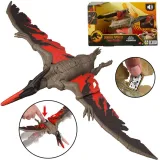 figurka pteranodona na tle kolorowego opakowania