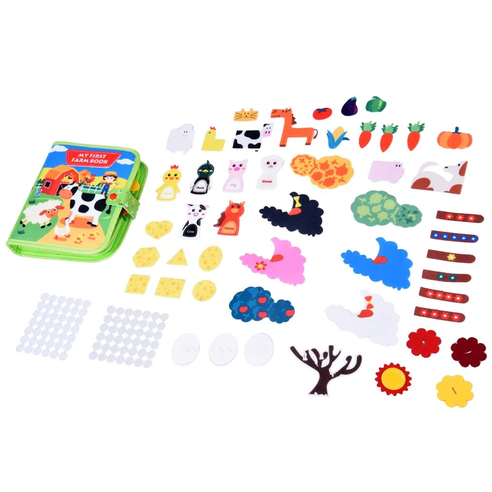 Zbliżenie na okienka i naklejki na rzepy w książeczce FARMA