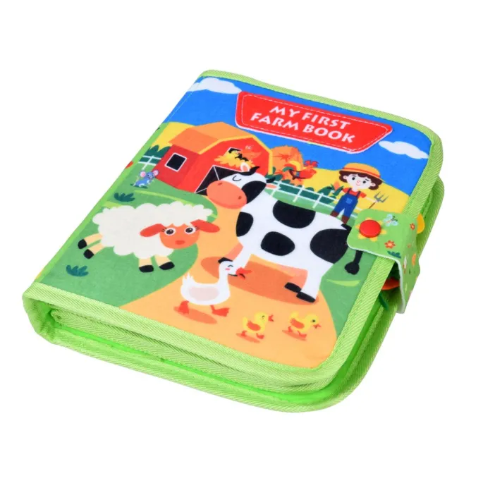 Interaktywne filcowe zwierzątka i warzywa widoczne na stronie książeczki