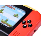 konsola retro gr0677 leżąca w otoczeniu akcesoriów do gier