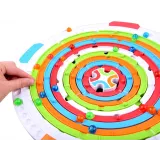 Pojemnik z kulkami w czterech kolorach przy grze OBROTOWA RULETKA