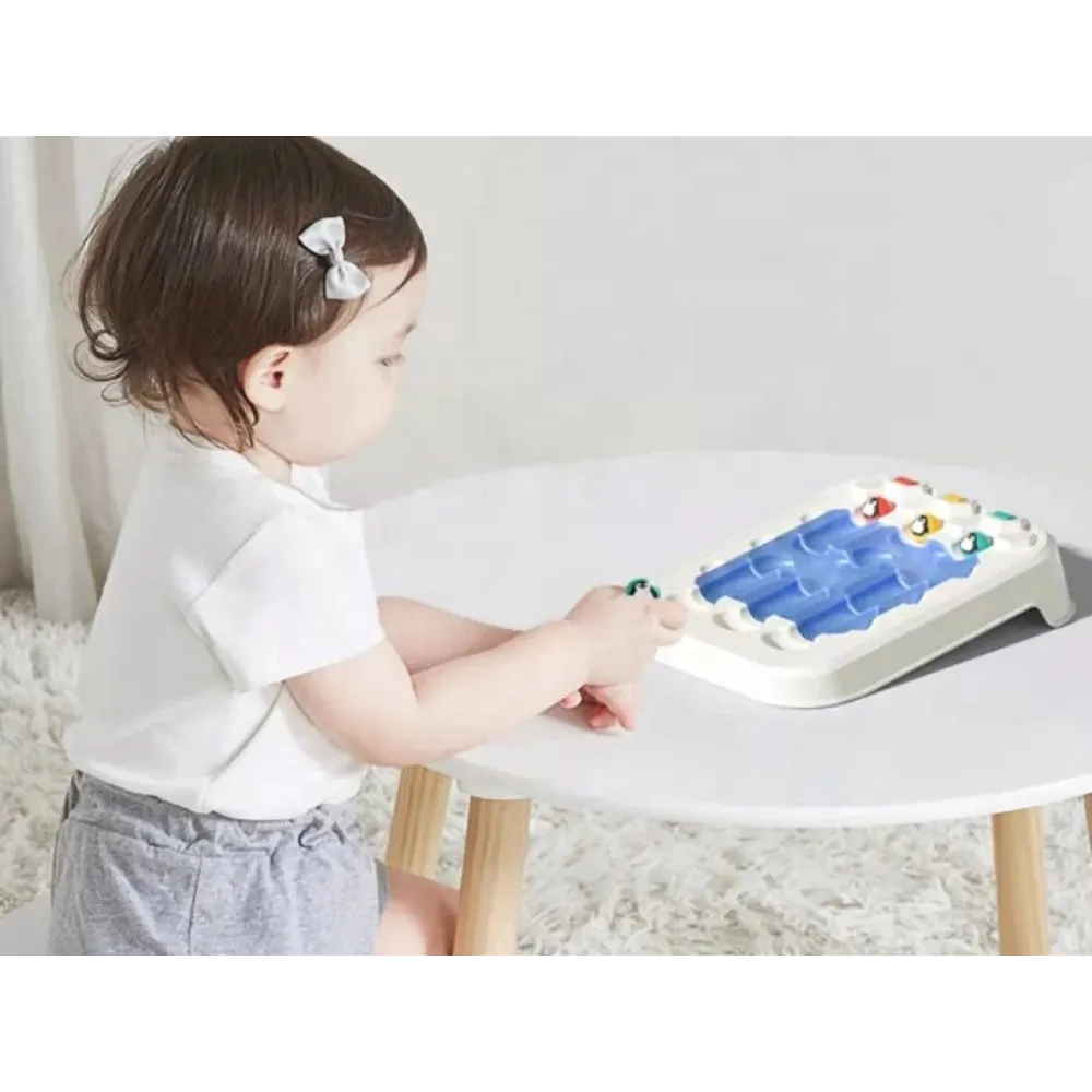 plansza z kolorowymi otworami na końcu trasy dla kul