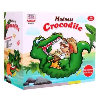 dziecko naciska zęby krokodyla w trybie refleksu