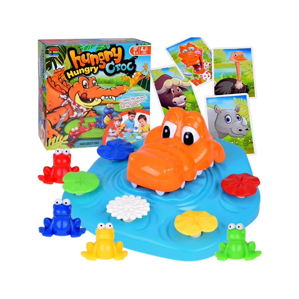 gra zręcznościowa głodny krokodyl i żabki zestaw na stole