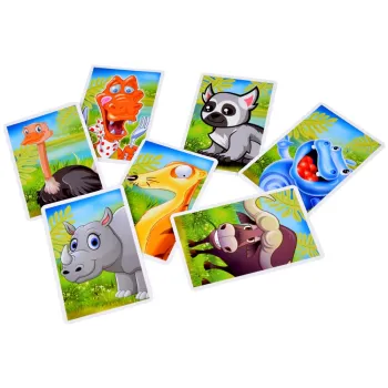 dzieci grające w głodnego krokodyla i uciekające żabki przy stole