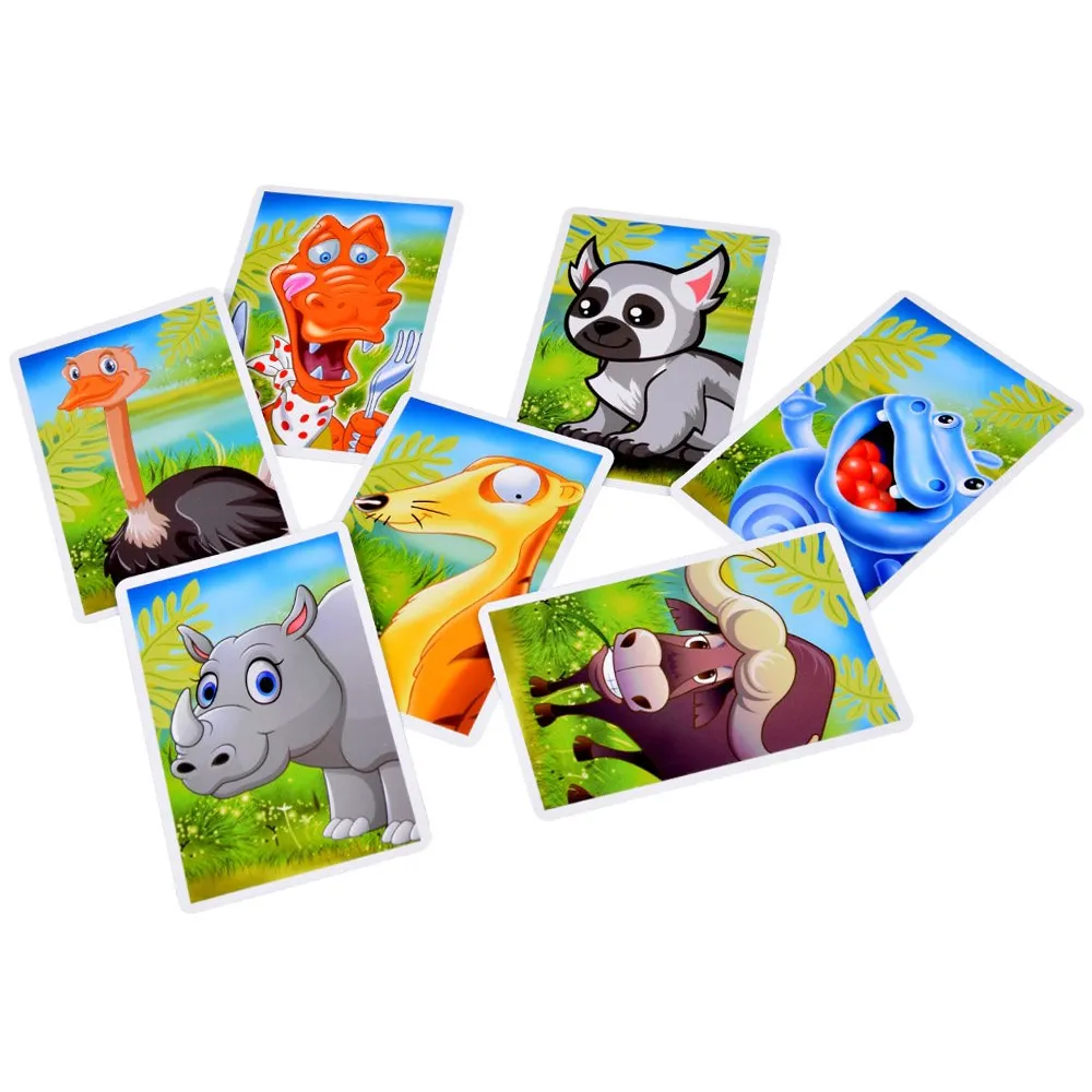 dzieci grające w głodnego krokodyla i uciekające żabki przy stole