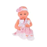 zbliżenie na twarz lalki z dużymi niebieskimi oczami i długimi rzęsami