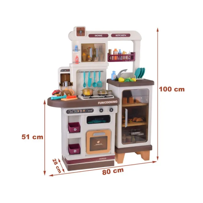 widok dużej kuchni zabawkowej z otwartym piekarnikiem