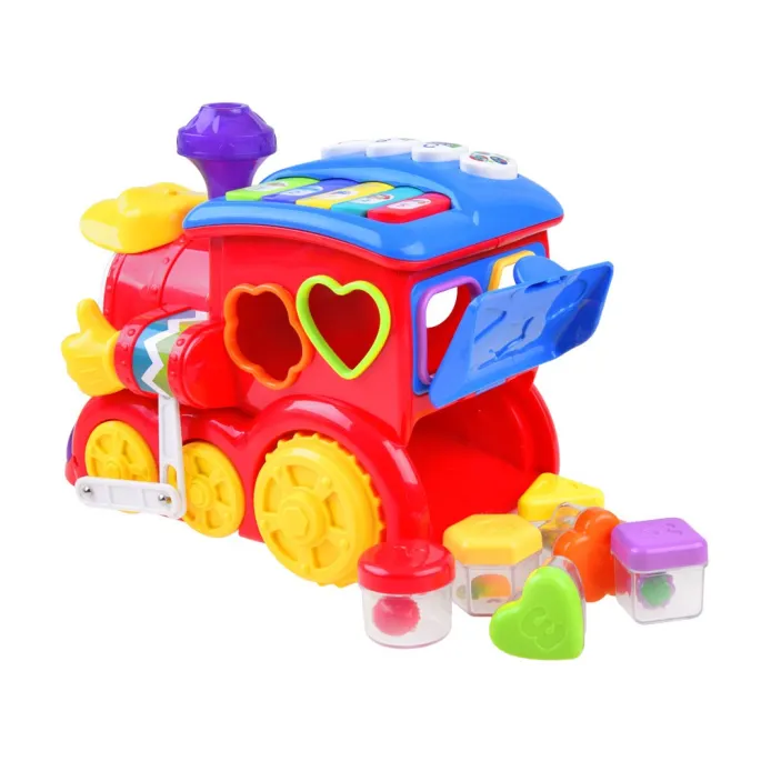 detal sortera z widocznymi otworami na klocki różnych kształtów